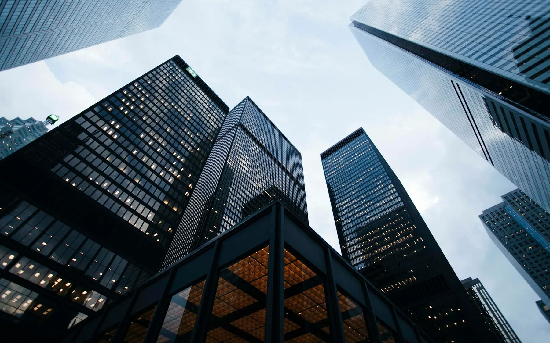Professional financial workspace with digital screens